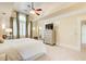 Beautiful main bedroom with large windows, ceiling fan, and neutral decor at 42 Greenland Trce, Atlanta, GA 30342