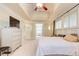 Spacious main bedroom featuring tray ceilings and large windows, creating a relaxing atmosphere at 42 Greenland Trce, Atlanta, GA 30342
