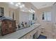 Bathroom with long countertop, mirror and drawers for storage at 4296 Linda Sw Ln, Lilburn, GA 30047