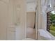 Bright bathroom featuring a vanity and natural light from the window at 4296 Linda Sw Ln, Lilburn, GA 30047