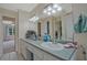 Bathroom with countertop, mirror and an open doorway to a bedroom at 4296 Linda Sw Ln, Lilburn, GA 30047