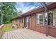 Cozy wooden deck with overhead lighting, perfect for outdoor entertaining and relaxation at 4296 Linda Sw Ln, Lilburn, GA 30047