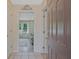 Welcoming entryway with tiled floors, open doorway to the living room, and neutral wall paint at 4296 Linda Sw Ln, Lilburn, GA 30047