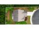 Bird's eye view of house, yard, and surrounding trees at 830 Nottingham Se Dr, Smyrna, GA 30082