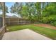 Patio with privacy fence and well-maintained lawn at 830 Nottingham Se Dr, Smyrna, GA 30082