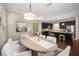 Open-concept dining area with kitchen view, perfect for entertaining at 830 Nottingham Se Dr, Smyrna, GA 30082