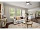 Open living room with views to dining room, perfect for entertaining at 830 Nottingham Se Dr, Smyrna, GA 30082