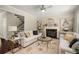 Inviting living room featuring a cozy fireplace and classic decor at 830 Nottingham Se Dr, Smyrna, GA 30082