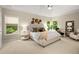 Serene main bedroom with ample natural light and stylish accents at 830 Nottingham Se Dr, Smyrna, GA 30082
