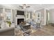 Inviting living room featuring a fireplace, comfortable seating, and natural light, creating a relaxing atmosphere at 1095 Elowen Dr, Austell, GA 30168
