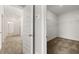 Walk-in closet with ample shelving, carpeting and room for storage and organization at 1095 Elowen Dr, Austell, GA 30168