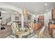 Open-concept living space that connects the dining area, kitchen, and living room, creating an inviting atmosphere at 5152 Rapahoe Trl, Atlanta, GA 30349
