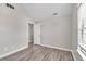 This bedroom features vaulted ceiling, hard surface floors and a window at 7262 Sandpiper Way, Riverdale, GA 30274
