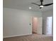 Neutral bedroom with ceiling fan and door to closet at 1661 Fuma Leaf Way, Mcdonough, GA 30253