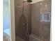 Walk-in shower with gray subway tile and rainfall showerhead at 1661 Fuma Leaf Way, Mcdonough, GA 30253