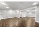 Spacious finished basement with wood flooring and recessed lighting, perfect for entertaining at 500 Gardenia Ln, Marietta, GA 30068