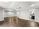 Finished basement featuring wood floors and a convenient half bathroom at 500 Gardenia Ln, Marietta, GA 30068