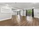Finished basement area with sliding doors to the outside, recessed lighting, and wood flooring at 500 Gardenia Ln, Marietta, GA 30068
