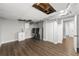 Finished basement area features a modern washer and dryer, utility sink, and wood flooring at 500 Gardenia Ln, Marietta, GA 30068