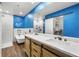 Modern bathroom with subway tile, soaker tub, dual vanity, and rain shower at 500 Gardenia Ln, Marietta, GA 30068