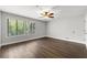Bedroom with hardwood floors, a ceiling fan, and natural light at 500 Gardenia Ln, Marietta, GA 30068