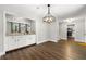 Dining area with built-in bar area, with an open view to the kitchen at 500 Gardenia Ln, Marietta, GA 30068