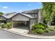 Exterior featuring covered parking with lush landscaping at 500 Gardenia Ln, Marietta, GA 30068