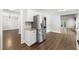 Open kitchen view with stainless appliances and convenient access to other living areas at 500 Gardenia Ln, Marietta, GA 30068
