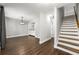 Bright living room featuring hardwood floors, fresh paint and a staircase at 500 Gardenia Ln, Marietta, GA 30068