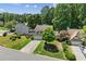 Aerial view of a home in a lush, green neighborhood at 850 Long Branch Cir, Sugar Hill, GA 30518