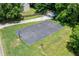 Outdoor basketball court. Active community fun with a well-maintained court surrounded by lush greenery at 850 Long Branch Cir, Sugar Hill, GA 30518