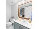 Bathroom featuring a modern sink, framed mirror, and grey walls at 850 Long Branch Cir, Sugar Hill, GA 30518