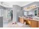 Bathroom with double vanity, walk-in shower, and tile flooring at 850 Long Branch Cir, Sugar Hill, GA 30518