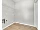 Functional laundry room with lots of open space, utility sink, and convenient access at 955 Mill Creek Ave, Canton, GA 30115