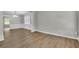 Spacious living area with wood floors, white trim, and a bright airy feel at 955 Mill Creek Ave, Canton, GA 30115