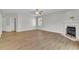 Spacious living room with a fireplace, offering a comfortable and inviting atmosphere at 955 Mill Creek Ave, Canton, GA 30115