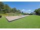 Community playground featuring swings and climbing equipment, with lush green space at 955 Mill Creek Ave, Canton, GA 30115