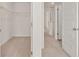 A bright hallway provides access to a closet and other rooms at 613 Lobelia Way, Locust Grove, GA 30248