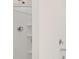 A bright shower features a shower head, faucet, and built-in shelves at 613 Lobelia Way, Locust Grove, GA 30248