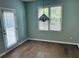 Inviting dining area with a decorative chandelier, hardwood floors, and natural light at 6605 New Ridge Court Ct, Cumming, GA 30041