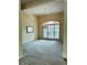 Dining room with chandelier, large window and neutral carpet at 6605 New Ridge Court Ct, Cumming, GA 30041