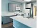 Modern kitchen with gray cabinets, white countertops, and stainless steel appliances at 6605 New Ridge Court Ct, Cumming, GA 30041
