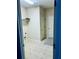Functional laundry room with neutral flooring and ample space at 6605 New Ridge Court Ct, Cumming, GA 30041