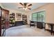 Functional bedroom features a desk, large window, and built-in shelving for storage and organization at 1580 Smyrna Sw Rd, Conyers, GA 30094