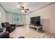 Spacious living room featuring hardwood floors and plenty of natural light at 1580 Smyrna Sw Rd, Conyers, GA 30094