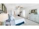 Spacious main bedroom with neutral decor, ample storage, and walk-in closet at 174 Aster Avenue, Locust Grove, GA 30248