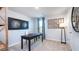 Cozy home office featuring a dark wooden desk and tasteful decor at 174 Aster Avenue, Locust Grove, GA 30248