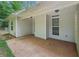 Covered back patio with a concrete floor, great for outdoor entertaining at 25 Pebble Creek Dr, Covington, GA 30016