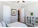 Bright bedroom with view to hallway, closet and ensuite bathroom at 2665 Crowbrook Way, Cumming, GA 30040