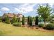 Beautiful community pool area with lush landscaping and resort-style amenities at 2665 Crowbrook Way, Cumming, GA 30040